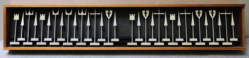 Midcentury Austin Cox Aluminum Chess Set.: Marked "© 1962/ Austin / Enterprises", as designed by Austin Cox for ALCOA. From an East Hampton, NY estate. Dimensions: King Pieces- 5" high. Case - 30.75" w x 5.875" d x 2.25" h. Condition: Good or