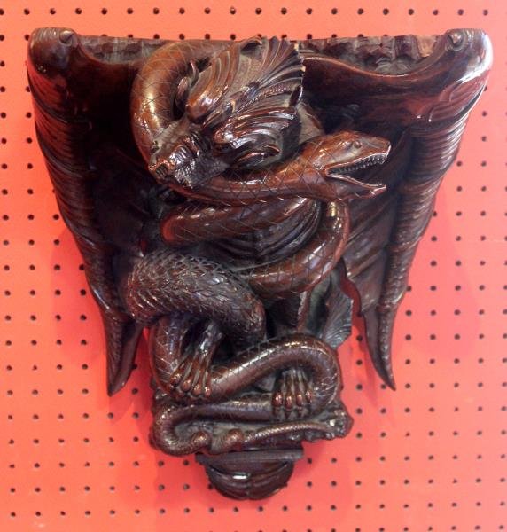 Highly Carved Wall Bracket with Dragon and Snake.: Beautifully and finely carved intertwined dragon and snake. From a New City, NY estate. Dimensions: 14.5" w x 11.5" d x 17.875" h.