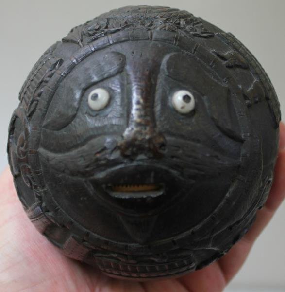 A Fine and Antique Folk Art Coconut, Carved as a Bank. (1 of 7)