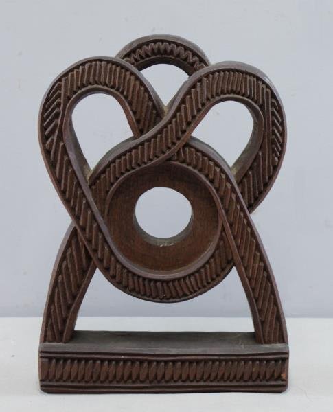 FAKEYE, Lamidi. Carved Wood Watch Hutch.: Made for noted horologist, Henry B. Fried. Signed and dated June 1963 on the underside. Lamidi Fakeye (Nigerian, 1928 - 2009). From a Larchmont, NY home. Dimensions: 12" high x 8.25" wide x 1.75" deep