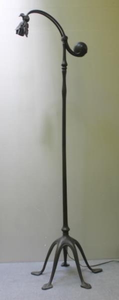 TIFFANY STUDIOS Bronze counter-balance floor lamp: with eggplant weight and goose neck, on octopus base. Stamped TIFFANY STUDIOS NEW YORK 468. 56" x 15". Original dark patina. Condition: Missing 1 large decorative screw, 2 smaller functional screws wi