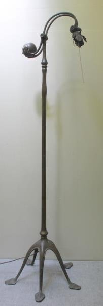 TIFFANY STUDIOS Bronze counter-balance floor lamp: with eggplant weight and goose neck, on octopus base. Stamped TIFFANY STUDIOS NEW YORK 468. 56" x 15". Original dark patina. Condition: Neck is probably bent.