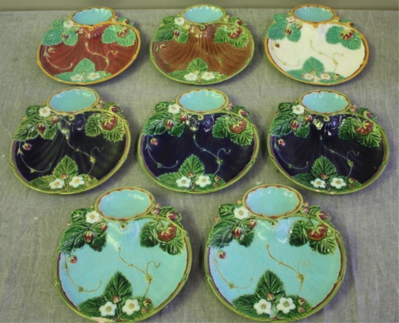 Set of 8 Minton Majolica Oyster Plates.: From a Manhattan estate. Dimensions: 8.25" w x 8.75" h. Condition: Chips, minor losses and fleabites. One with old staple repair.