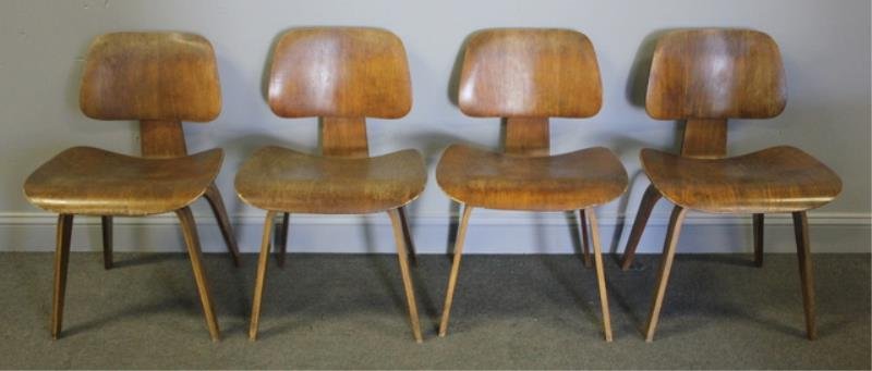 Midcentury Set of 4 Eames LCW Chairs.: Unmarked. Ray & Charles Eames for Herman Miller. Nice set of 4 in medium finish. From a Long Island, NY estate. Condition: With some wear and scratches. Overall finish roughness to each.
