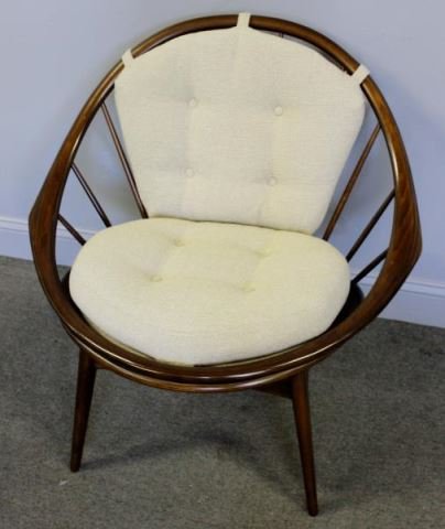 Ib Kofod Larsen for Selig Hoop Lounge Chair.: Made in Denmark / Selig Button Label. With spindle back and round frame. From a Long Island, NY estate. Dimensions: 34" w x 28" d x 33" h Condition: Good.