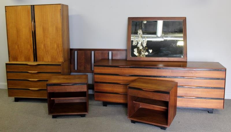 Midcentury John Kapel / John Stuart Bedroom Set.: Nice complete midcentury bedroom set designed by John Kapel and retailed by John Stuart. Includes a double dresser, a two-piece tall chest with fitted interior over 4 drawer chest, a pair of one drawe