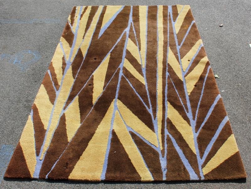 Edward Fields Modernist Rug.: Blue, brown and tan abstract design. From a Roslyn, NY estate. Dimensions: 6' 1" x 10' 7" Condition: good.