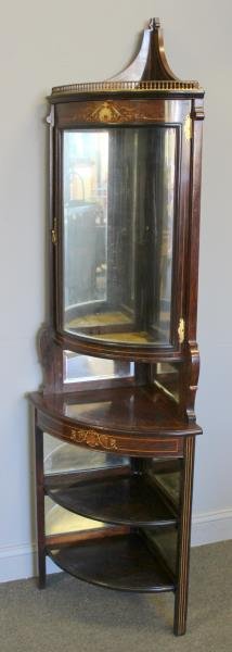 Edwardian Rosewood Corner Cabinet with: Mother of Pearl Inlay. From a Yonkers, NY estate. Dimensions: 23.5" w x 73" h. Condition: Good.