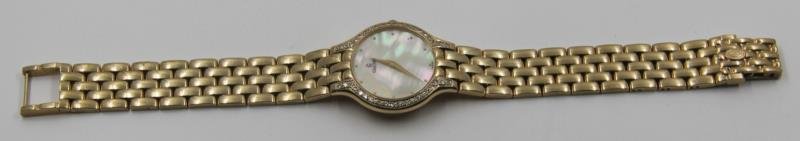 JEWELRY. 14kt Gold Concord Ladies Wrist Watch.: With diamond surround. Total approx. weight is 34.1 dwt. From a 42nd Street, Manhattan estate. Condition: All watches sold as is.