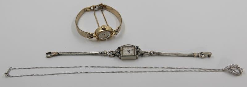 JEWELRY. Gold Watch and Necklace Grouping. (1 of 8)