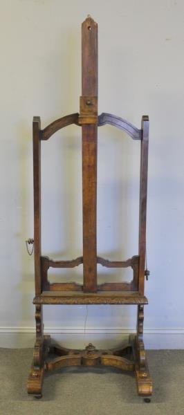 Carved Wood Victorian Artists Easel.: From a Harrison, NY estate. Dimensions: 21.5" w x 22" d x 70" h. Condition: Good.