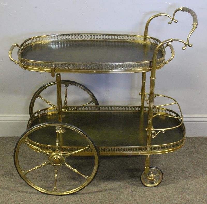 Vintage Brass Tea Cart with Tooled Leather Lined: Tray Top. From a Rye, NY estate. Dimensions: 33" w x 24" d x 31" h. Condition: Good.