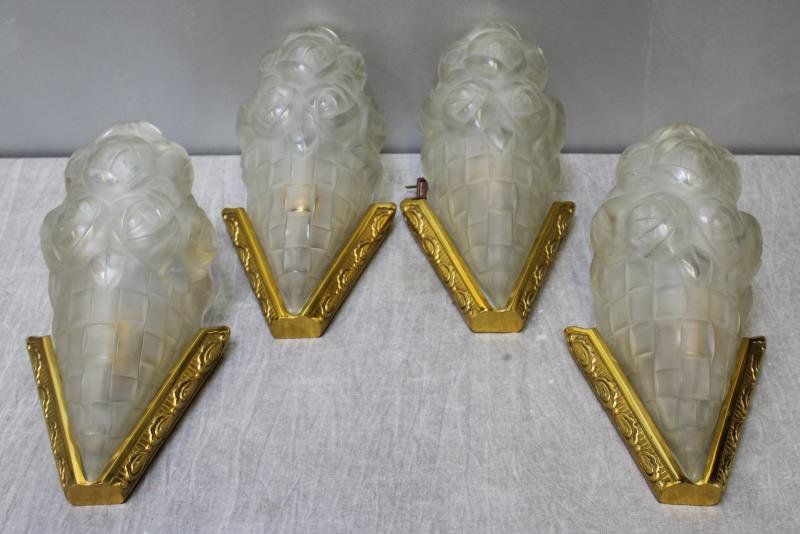 Set of 4 Signed Degue Flower Basket Form Sconces.: Art deco style with brass wall mounts. Shades in the form of flowers and flower basket signed Degue. Dimensions: 7" w x 6" d x 12" h. Condition: good.