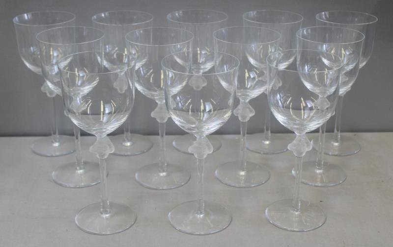 LALIQUE, France Set Of 12 Signed Glasses .: Signed on the base and from an east 58 st NYC estate . Dimensions: 8.5"H Condition: good