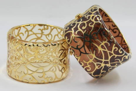 JEWELRY. Two Angelique de Paris Cuff Bracelets.: Beautiful scroll form silver overlay with gold wash. Stamped, "Angelique de Paris, 925". From a Princeton, NJ home. Dimensions: approx. 1.875" in width.