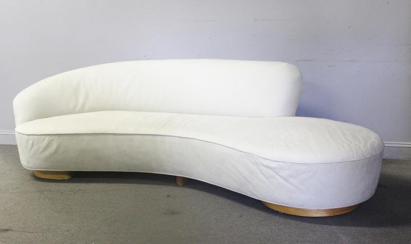 Midcentury Vladimir Kagan Cloud Sofa.: In exceptional leather upholstery. Raised on wood platform bases. Unmarked. From a celebrity Aspen home. Condition: Good with some wear from use to upholstery.
