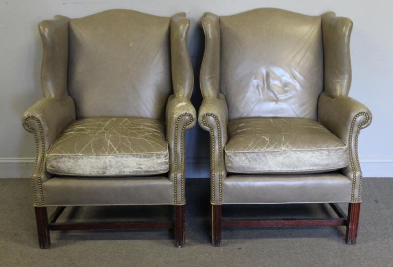 Pair of Leather Upholstered Wing Arm Chairs. (1 of 1)