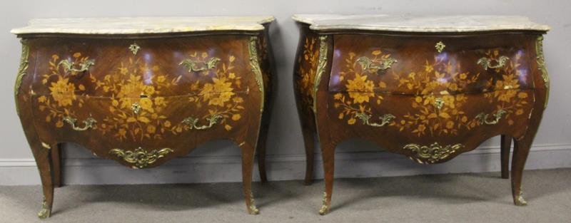 Pair of Louis XV Style Parquetry Inlaid Marbletop: Bombe Commodes, (20th century). From a Scarsdale, NY estate . Dimensions: 40" x 19" d x 32" h. Condition: Veneer losses, chip to bottom of 1 drawer.