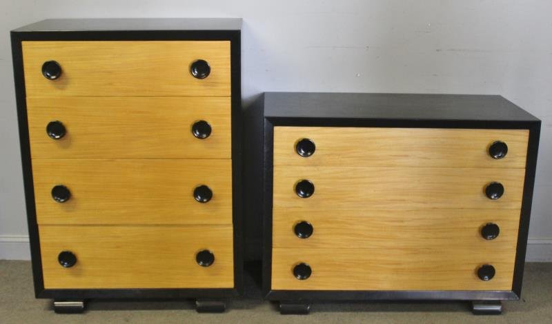 Midcentury Gilbert Rohde Style Dresser Set.: Includes a tall chest with black finish and pulls, together with a low dresser. Labeled Americraft. From a Brooklyn, NY estate. Dimensions: Tall - 35" w x 20" d x 47"h; Low - 43.5" w x 20" d x 34" h.