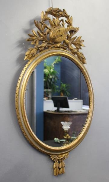 Gilt Mirror with Stringed Instrument Decoration. (1 of 3)