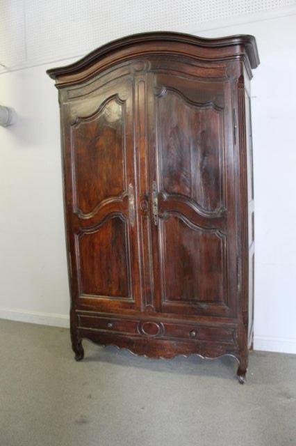 18 Century French Provincial 2 Door Armoire: Dimensions: 64" w x 28" d x 98" h.From a Harrison NY estate . Condition: good age appropriate