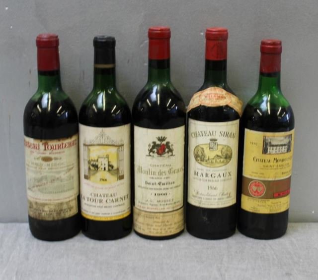 Mixed 5 Bottle Lot of French Wine 1966 & 1970.: Mixed lot of French wine from 1966-1970. Chateau Monbousquet 1970 into the neck. Chateau Tourteran 1970 high shoulder. 1966 Moulin Des Graves into the neck. 1966 Chateau LaTour Carnet mid shoulder. 19
