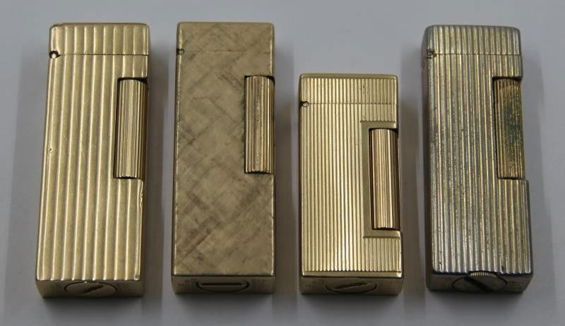 GOLD. Collection of 3 14kt Gold Dunhill Lighters. (1 of 8)