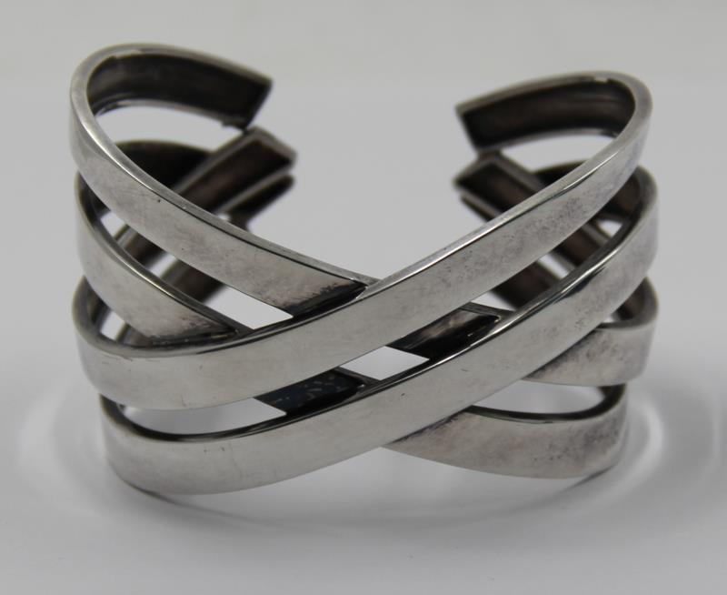 JEWELRY. Paloma Picasso for Tiffany Sterling Cuff: Bracelet. Stamped to interior, "Paloma Picasso for Tiffany & Co, Sterling, France". With additional stamp to exterior, "C.1987". Total approx. weight is 2.23 troy oz. From a Bedford, NY estate. Dimens