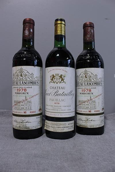 Chateau Lascombes & Chateau Batailley 1978 Wine: This lot has 2 bottles of Chateau Lascombes 1978 with high shoulder fill. It also has 1 bottle of Chateau Batailley Haut Pauillac 1978 with fill into the neck. From a Long Island New York Estate. Cond