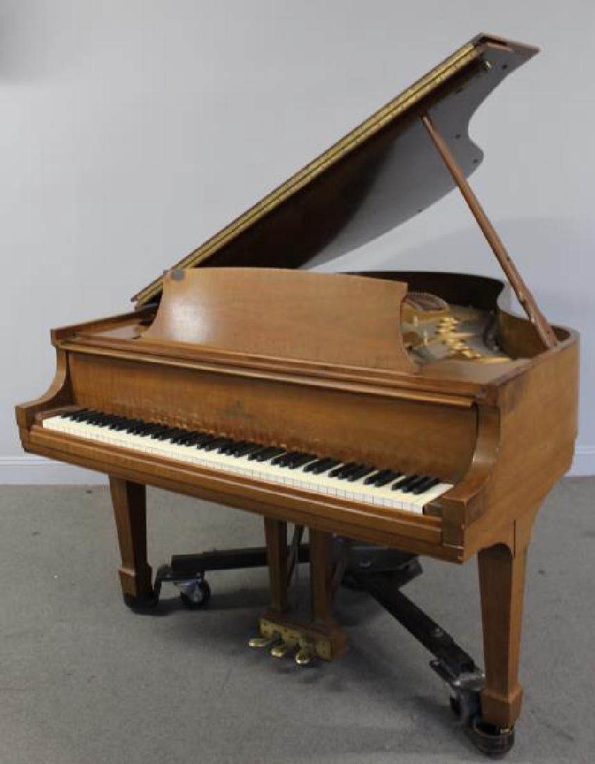 Steinway & Sons Model M Baby Grand Piano Serial #370075: Piano has a walnut case and belonged to a piano teacher. From a New City, NY estate. Condition: Case has scuffs and scratches, plays and sounds good. Board looks good.