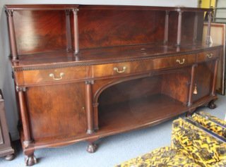 Large Mahogany Sideboard Raised on Ball: and Claw Feet with Backsplash. From a Bronx, NY estate. Dimensions: 108" x 24" x 59" h including backsplash. Condition: good, scuffs, scratches, some losses.