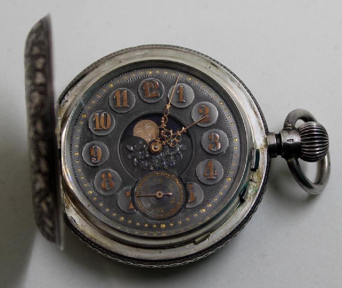 JEWELRY. Antique Swiss .875 Silver Pocket Watch.: Hunter case Swiss .875 silver pocket watch stamped on each interior side with the Swiss pictorial hallmark of a standing bear - representative of .875, also included in this pictorial stamp is a town