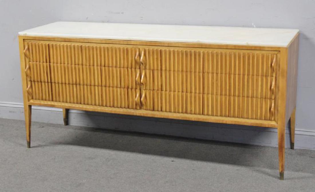 Midcentury Italian Sculpted Front Dresser.: Exceptional blond wood dresser with sculpted drawer fronts and sculpted pulls. With alabaster top and brass capped feet. Unmarked. From a W. 89th St., NYC estate.