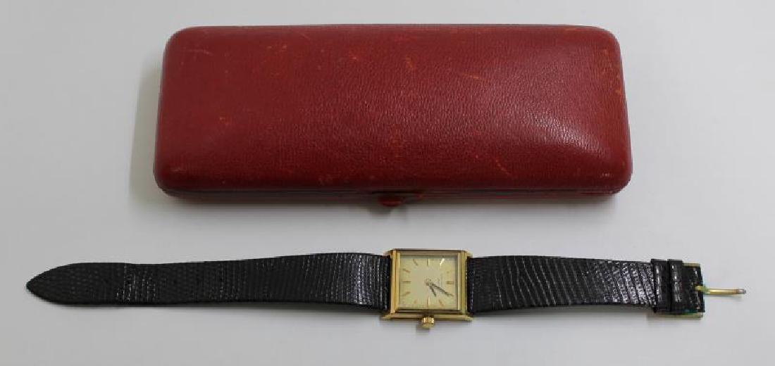 JEWELRY. Ladies 18kt Gold Patek Philippe Watch.: Ladies Patek Philippe 18kt yellow gold watch - Patek Philippe & Co. 18 jewels movement, no. 857694. Patek Philippe 18kt gold watch case, no. 2630778, ref. no. 3315. With Patek Philippe Geneve red watc