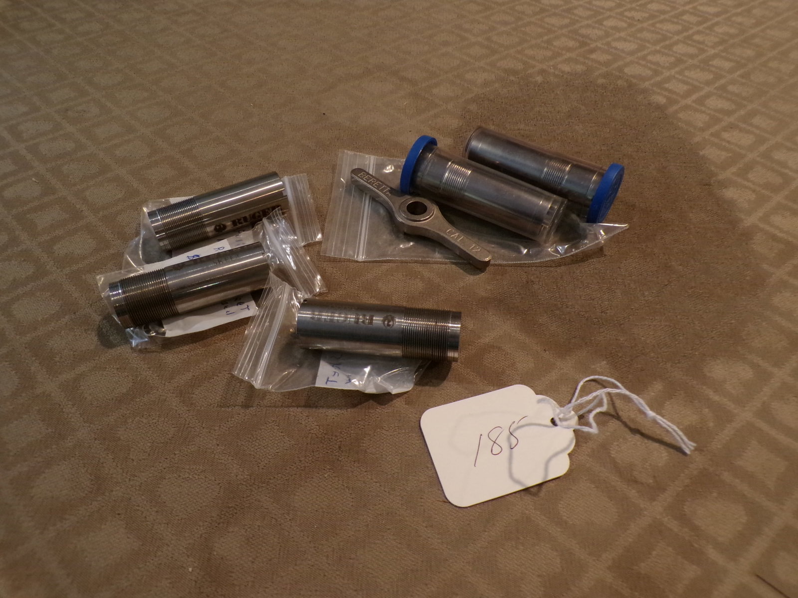 LOT OF RUGER & BERETTA CHOKES: AS SHOWN IF YOU HAVE ANY QUESTIONS PLEASE ASK