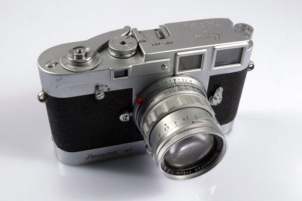 Leica MP-287 "Fake": Leica MP-287 Fake with 50mm Summicron f2 and Leicavit M Rapid Winder SYOOM-M Chrome. A fake Leica MP, one made during the 1960s. A very unusual camera. Some wear on back door.