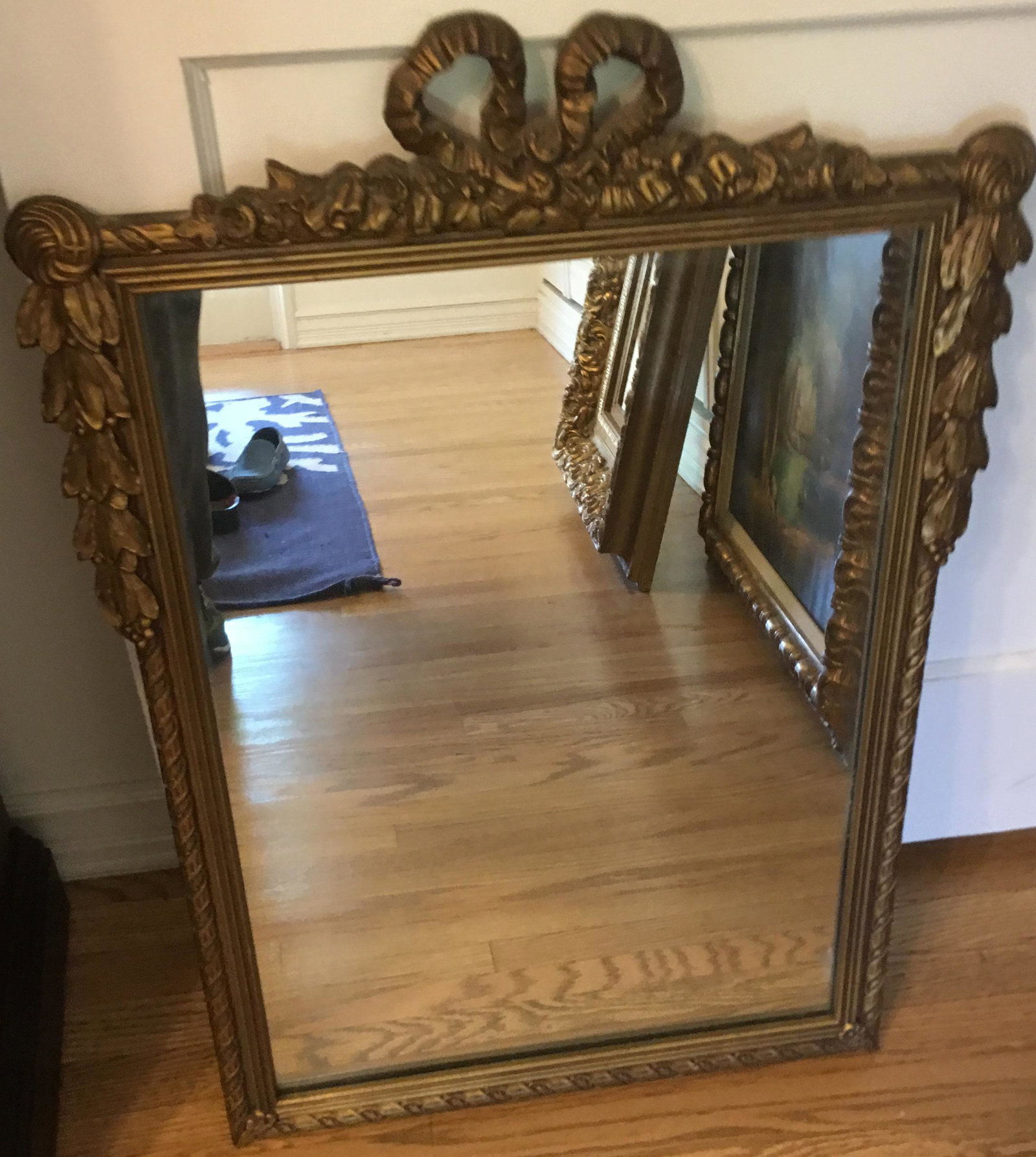 Antique Gilded wood Frame Mirror: Circa 1890, with a beautiful hand carved frame, the mirror and the frame are I very good conditions. Measures 32.5" X 22.5".