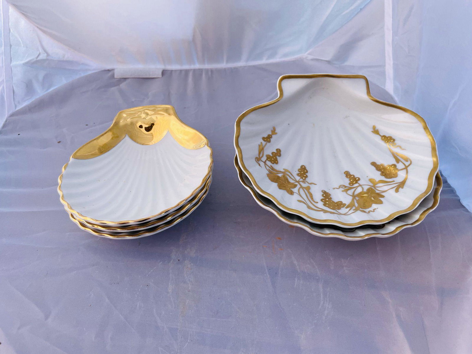 Vintage Lot of Candy Dishes: 3 are smaller and are Royal Worcester. Each measures 5" X 4.35". Gilded handle. The other 2, are larger but have a different design and are Limoges. They measure 5.25" X 5.5". Sold as a lot.
