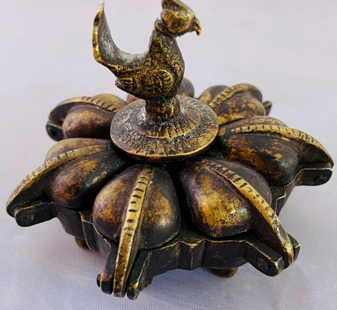 Antique Indian Brass and Iron KumKum Box Tika: Dates probably to 1920's. Tested with magnet, the base is cast iron but the leaves and the rooster are brass.