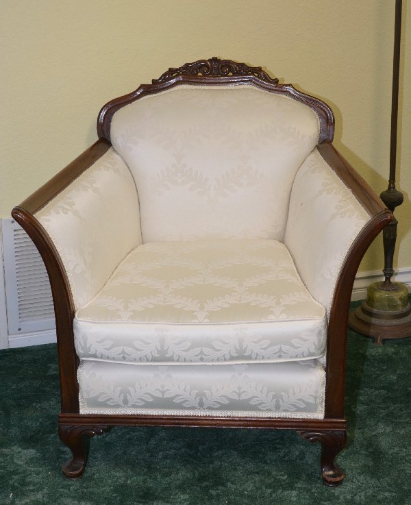 Duncan Phyfe Armchair: Period armchair with rolled arms, carved front legs, matching pair with the sofa, 34” in height, width of 30” between arms. Upholstery has a small spot of 1cm. which can be cleaned.