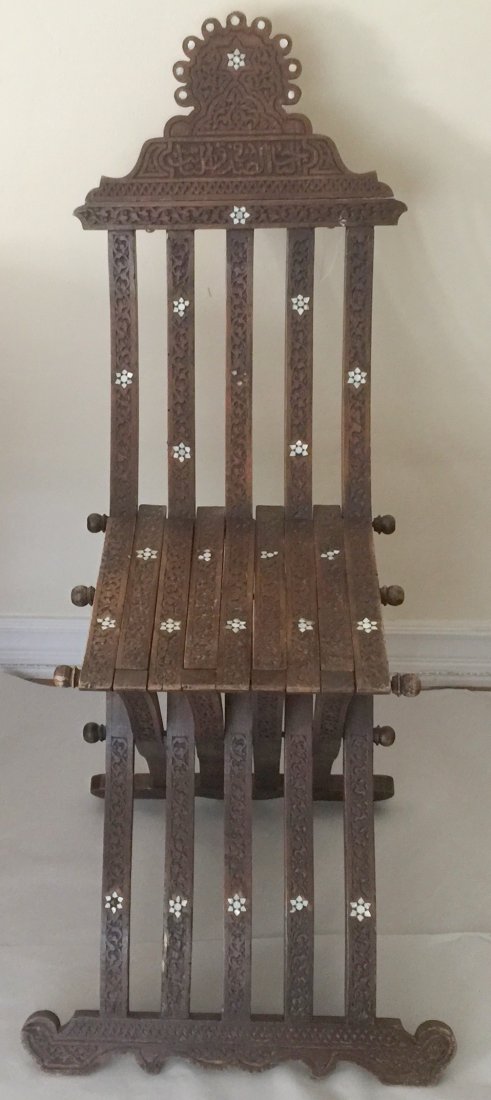 Antique Savonarola Chair: This Savonarola chair must be from Syria, (see the Arabic characters), pitifully carved with lots of mother of pearl. The top part needs some glue but otherwise, aside some chips normal for its age, i
