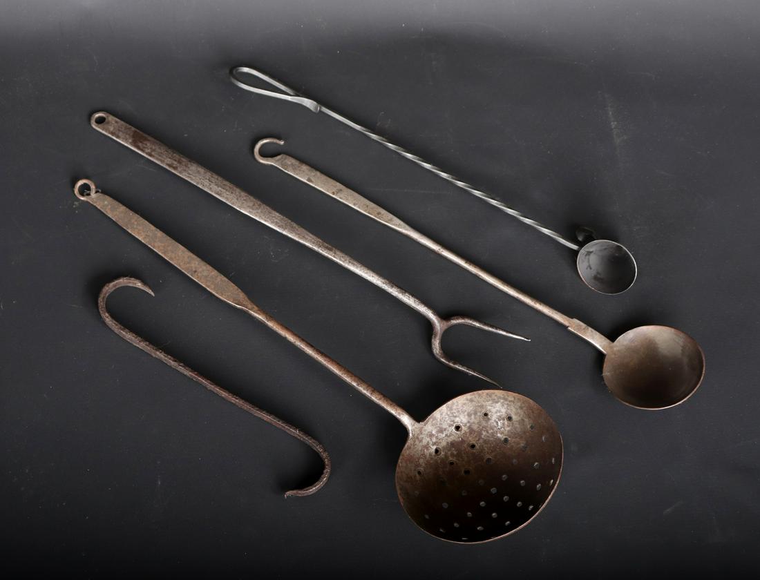 Group of Antique Wrought Iron Implements: Group of 5 antique wrought iron implements for various purposes including three spoons, a fork, and a hook. _x000d_largest 18" L