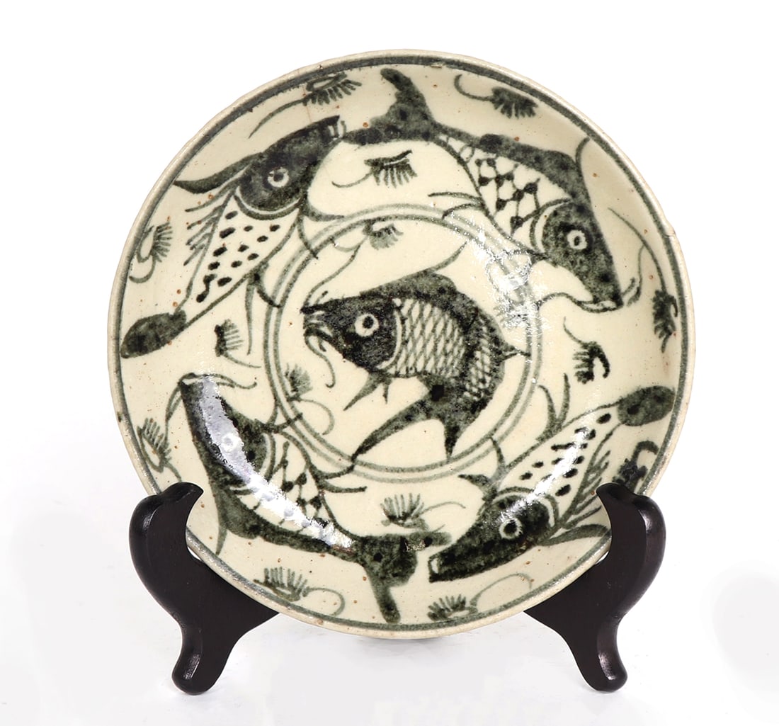 Fine Black Koi Plate in Basket Frame: 18th century fish plate with various depictions of koi or carp to the face in a black paint and cream color. Plate 6 3/4" H, in basket frame 10 3/8" H (stand for photography purposes only)