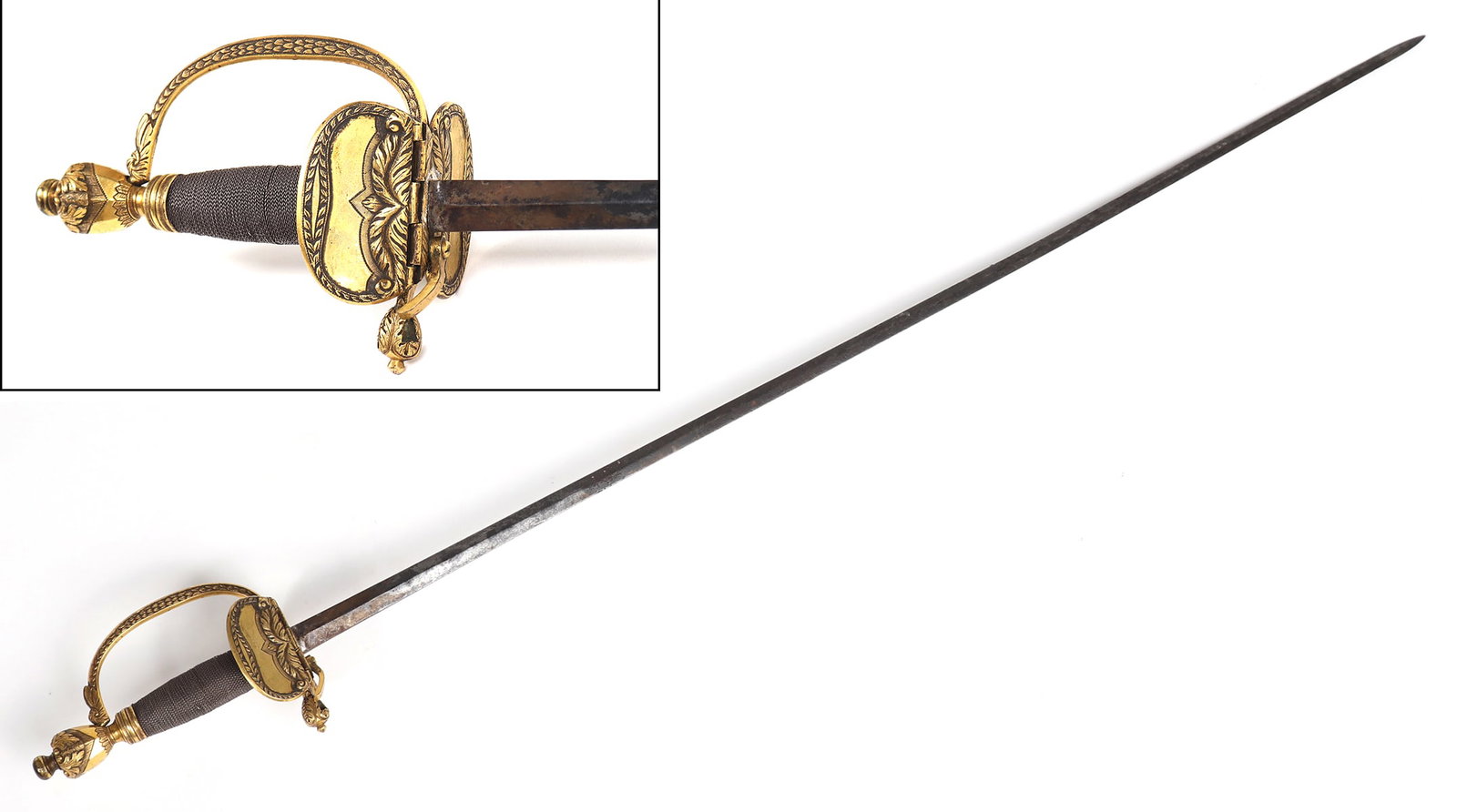 British Officers Dress or Smallsword w/Hinged Guard: British Army Officers Dress or Small sword referred to as an Epee w/Hinged Guard in original condition, small sword with a double edged blade, single side hinged clam guard in brass carved in scrollin