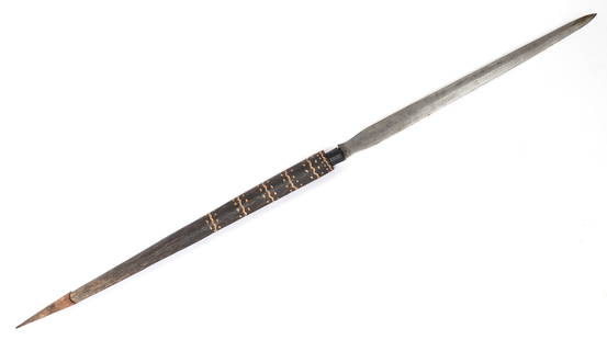 Philippine Moro "Budiak" Short Spear, 20th c.: Philippine Archipelago, Moro 20th century Budiak short spear with a short sword length blade that is double edged and lightly flared at the base. Connects to a carved wood shaft decorated with light c