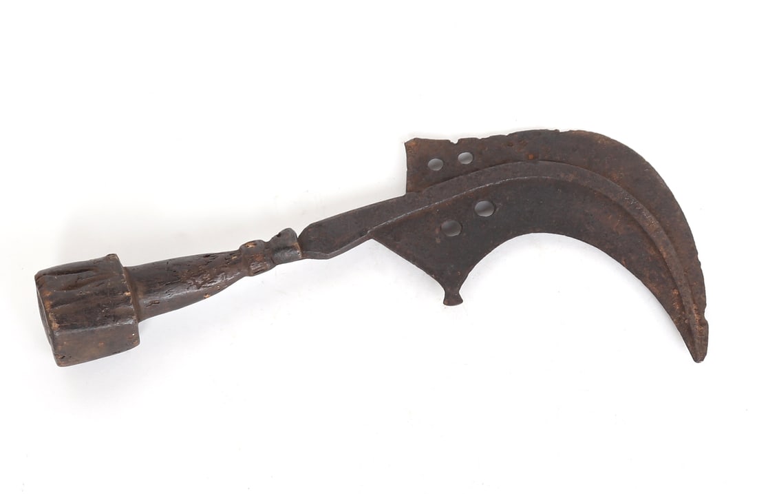African Hand Sickle w/ Unusual Handle: Wide curved hook blade pierced to the base with several punches and fixed to a wood handle this example with an unusual square base. Size 13 3/4" overall, 7 3/4" H x 7 1/2" W