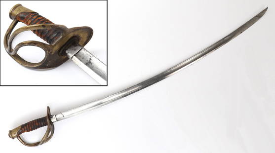 M1860 Light Cavalry Saber Sword, Civil War Period: U.S. Civil War M1860 Light Cavalry Saber Sword used by US Cavalry during the American civil war and into the Spanish American War. Brass handle with original grip and a long curved single edge blade