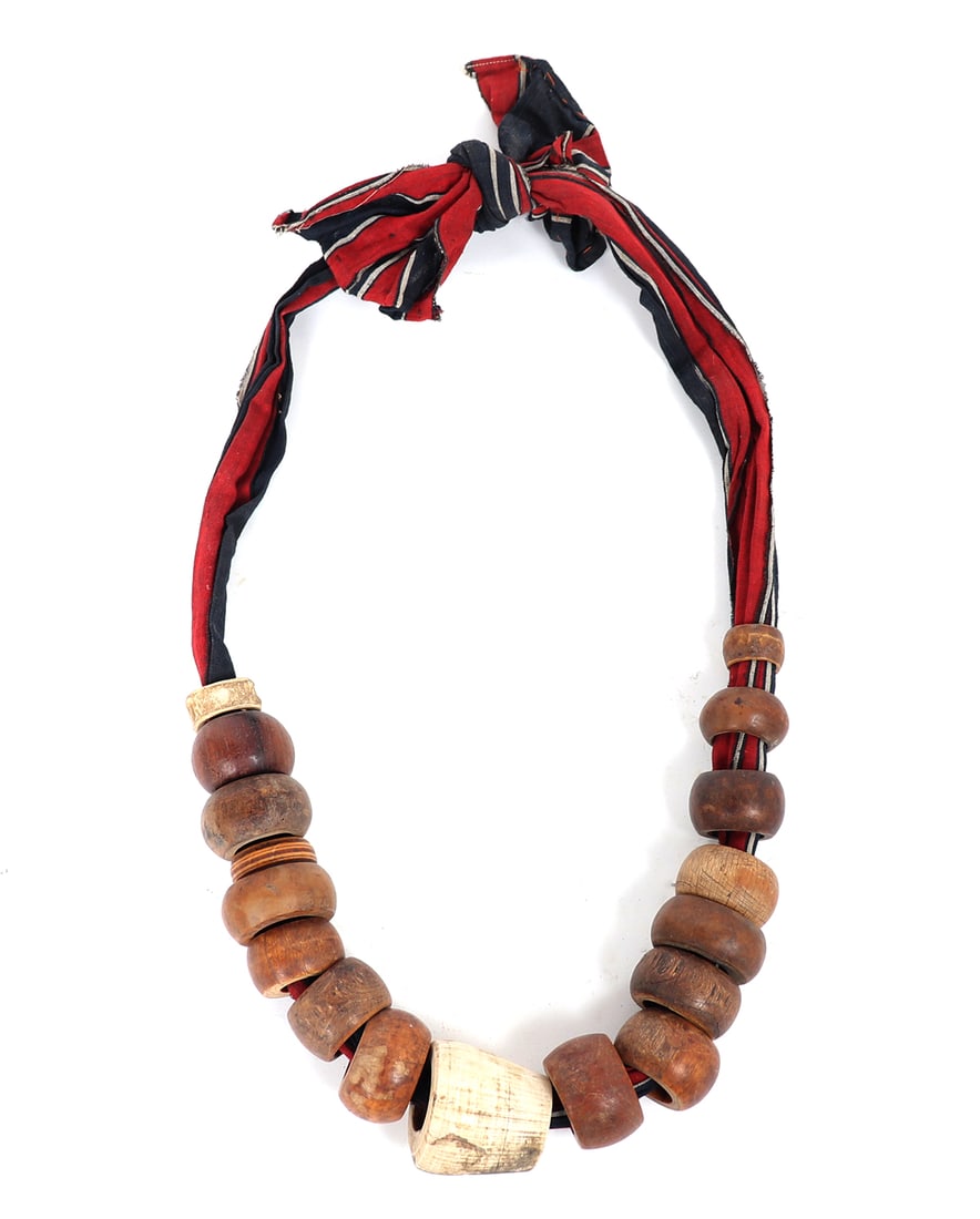 Igorot Lightning Belt: Polished shell, bone and wood bangles make up this old Igorot lightning belt, used in ceremonies to bring rain during heavy droughts. Size 21" L