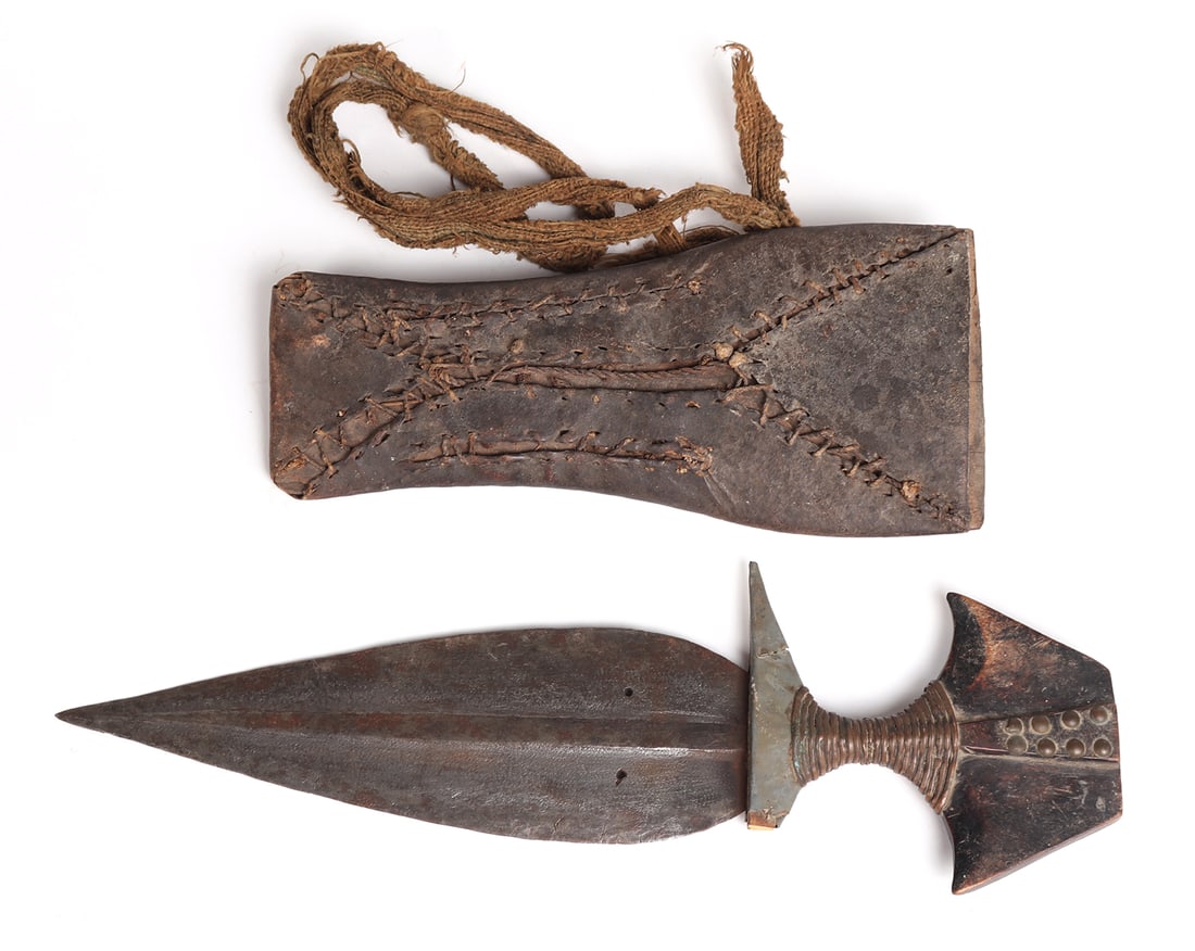 Original Congolese Dagger w/ Sheath, Early 20th c.: Africa, Congo Region, probably 20th c. or sarlier Congolese dagger with original sheath and twine, the dagger features a pointed ovoid shaped blade with raised central ridge and pierced holes to eithe