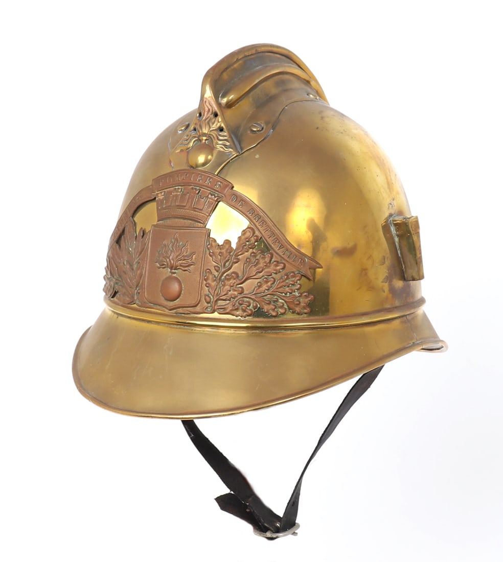 Brass French Sapeurs Helmet: Attractive all brass French sapeurs helmet with chinstrap, liner absent. Size 10" L x 7 1/2" HInternational Arms and Armour Collection
